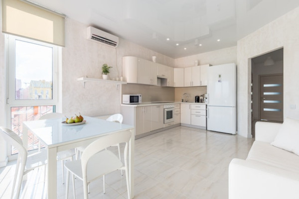 an air conditioner outlet in an airy kitchen