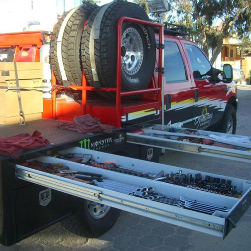 red service truck with underbody toolbox